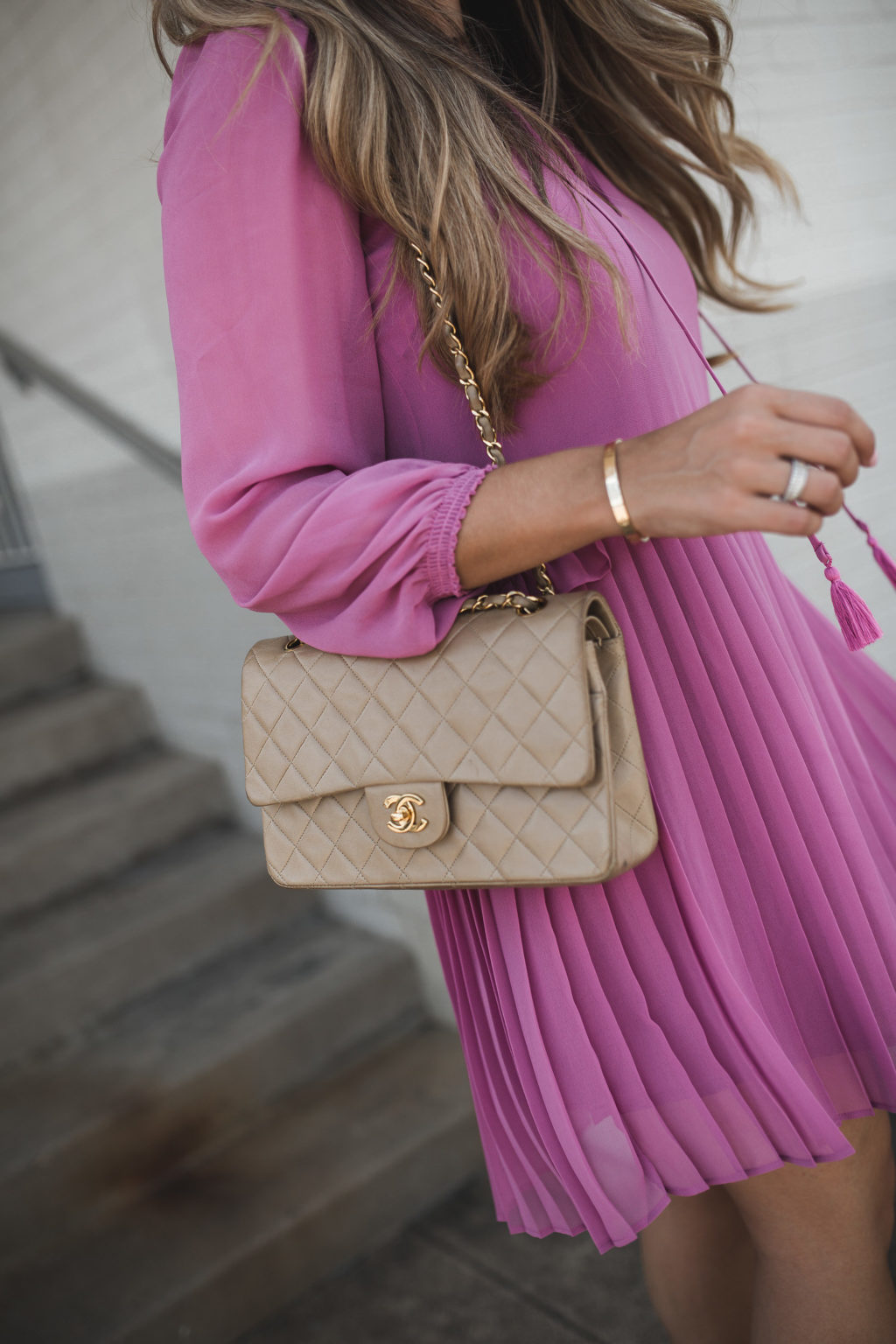chanel bag and pink dress