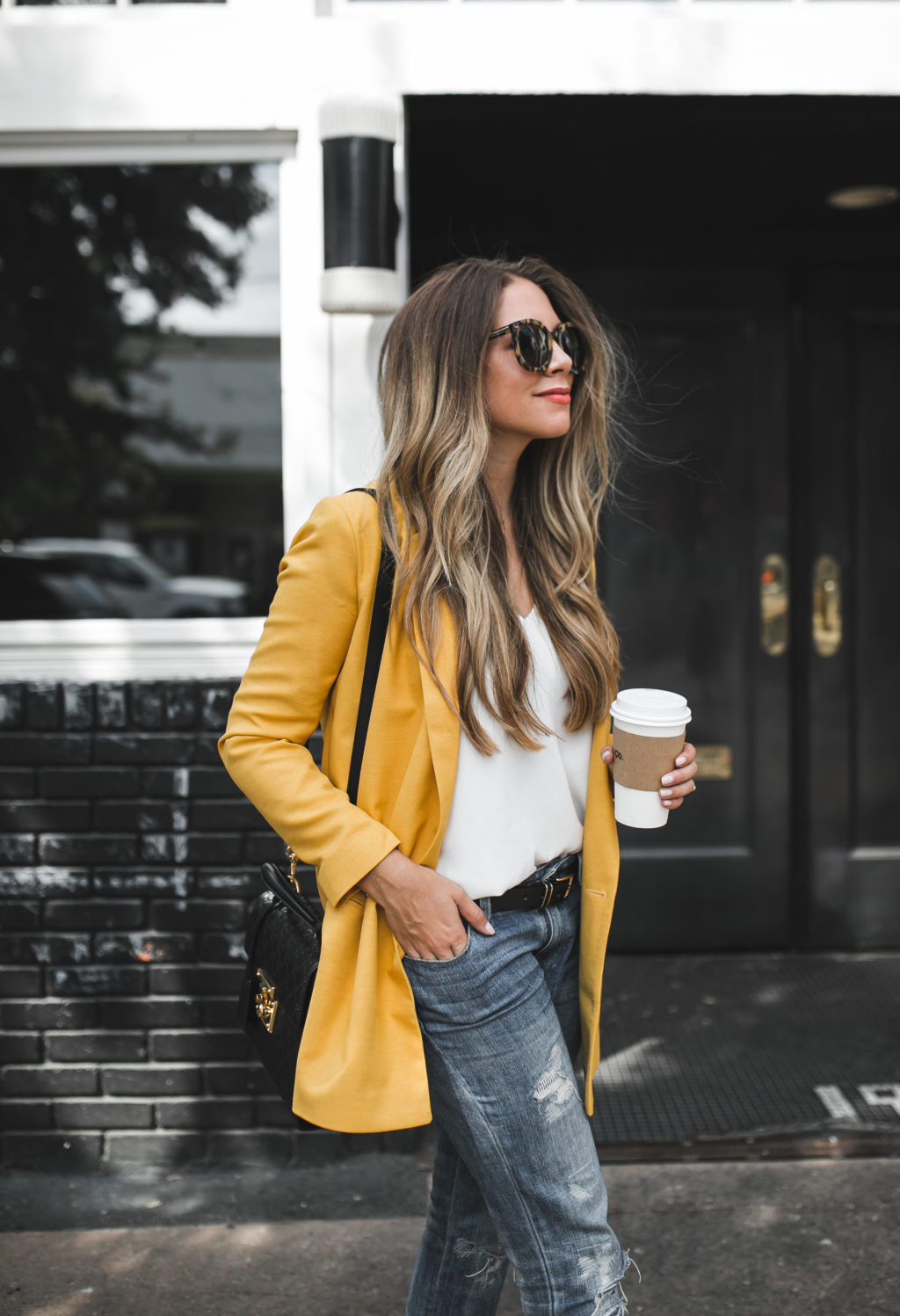 yellow blazer and karen walker sunglasses