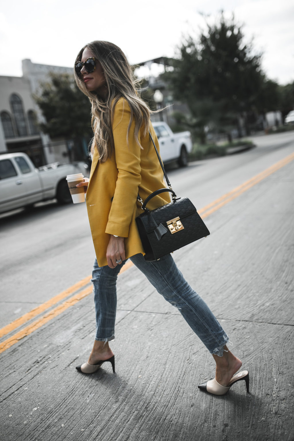 yellow blazer and Gucci padlock bag