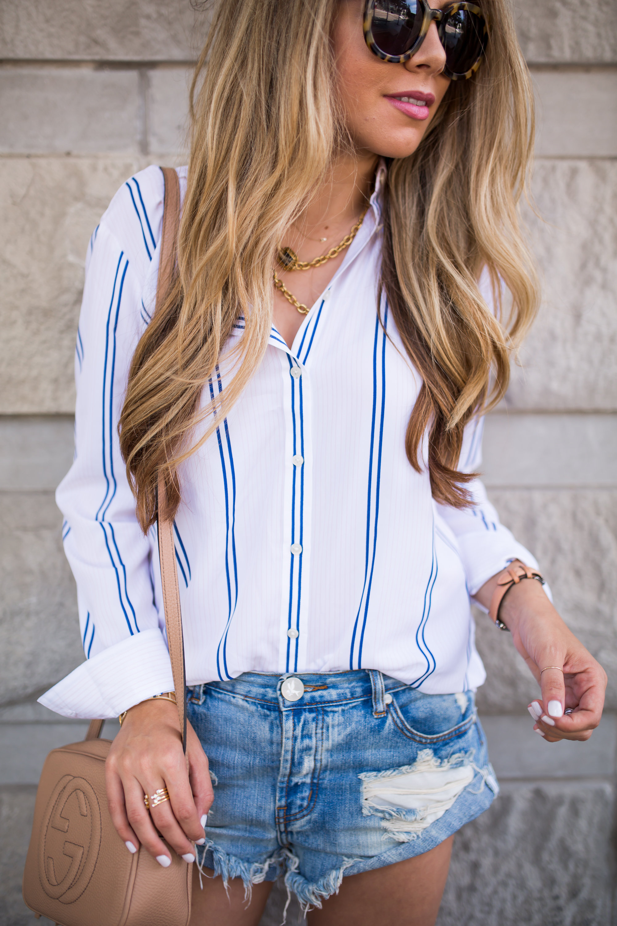 Striped shirt and denim shorts