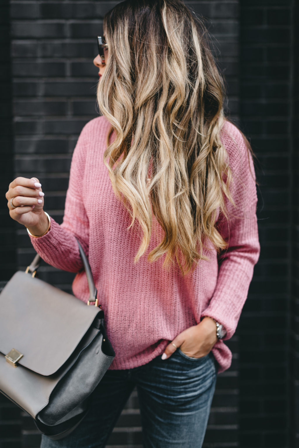 pink sweater and denim