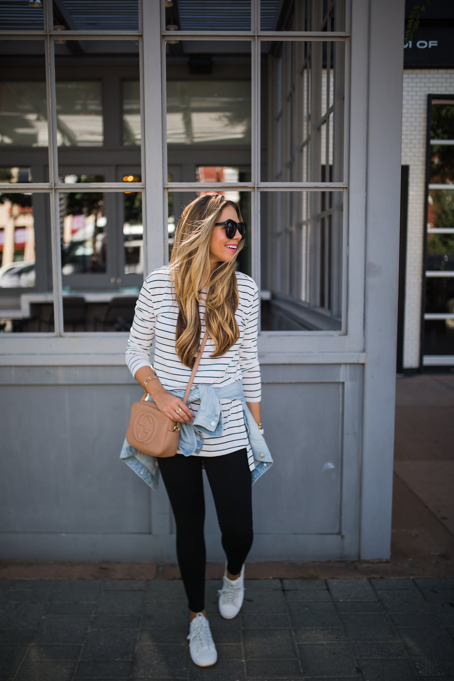 Denim Jacket Tied Around The Waist 