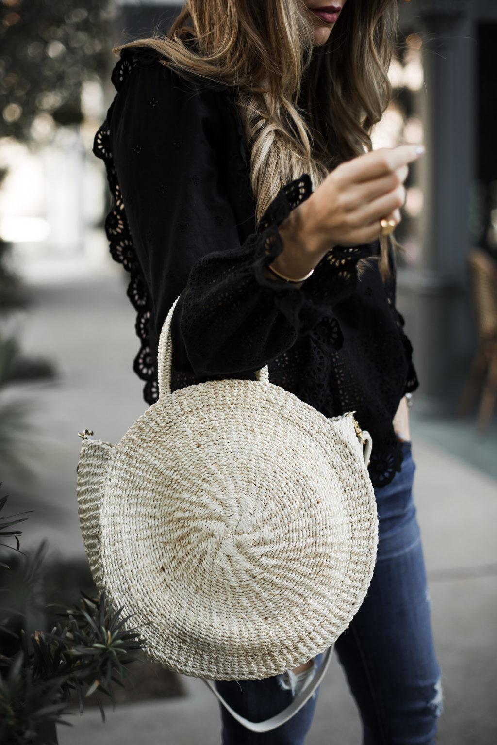 Clare V. Round Straw Tote and Eyelet Blouse