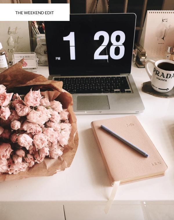 Flowers on Desk with Clock Screen