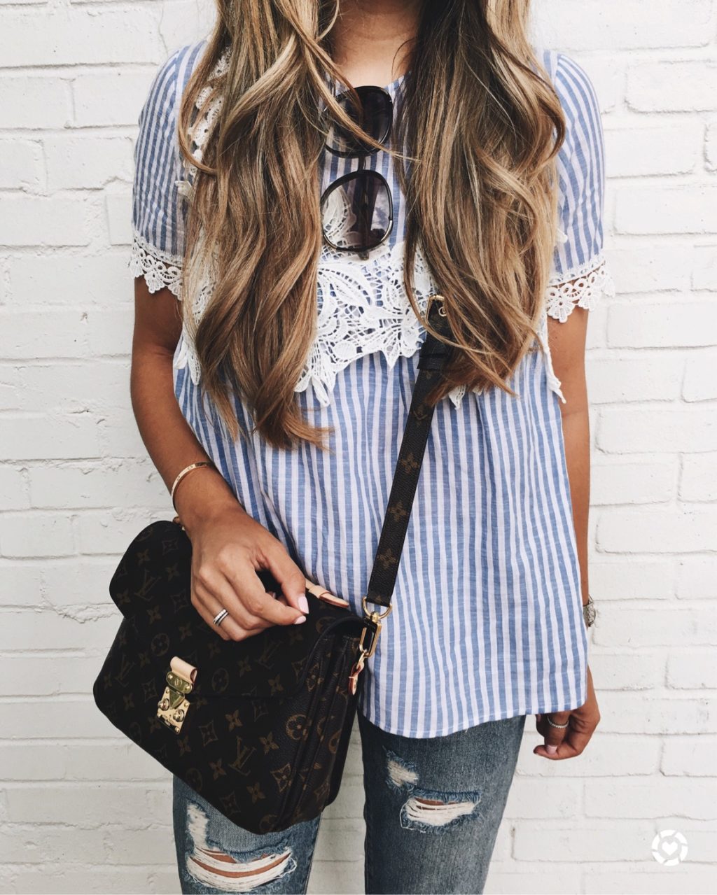 striped lace blouse and ripped jeans