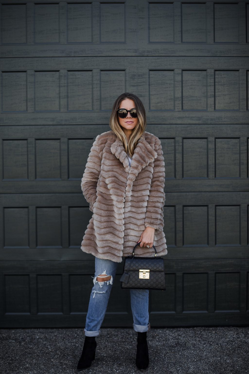 Distressed denim + Faux fur coat