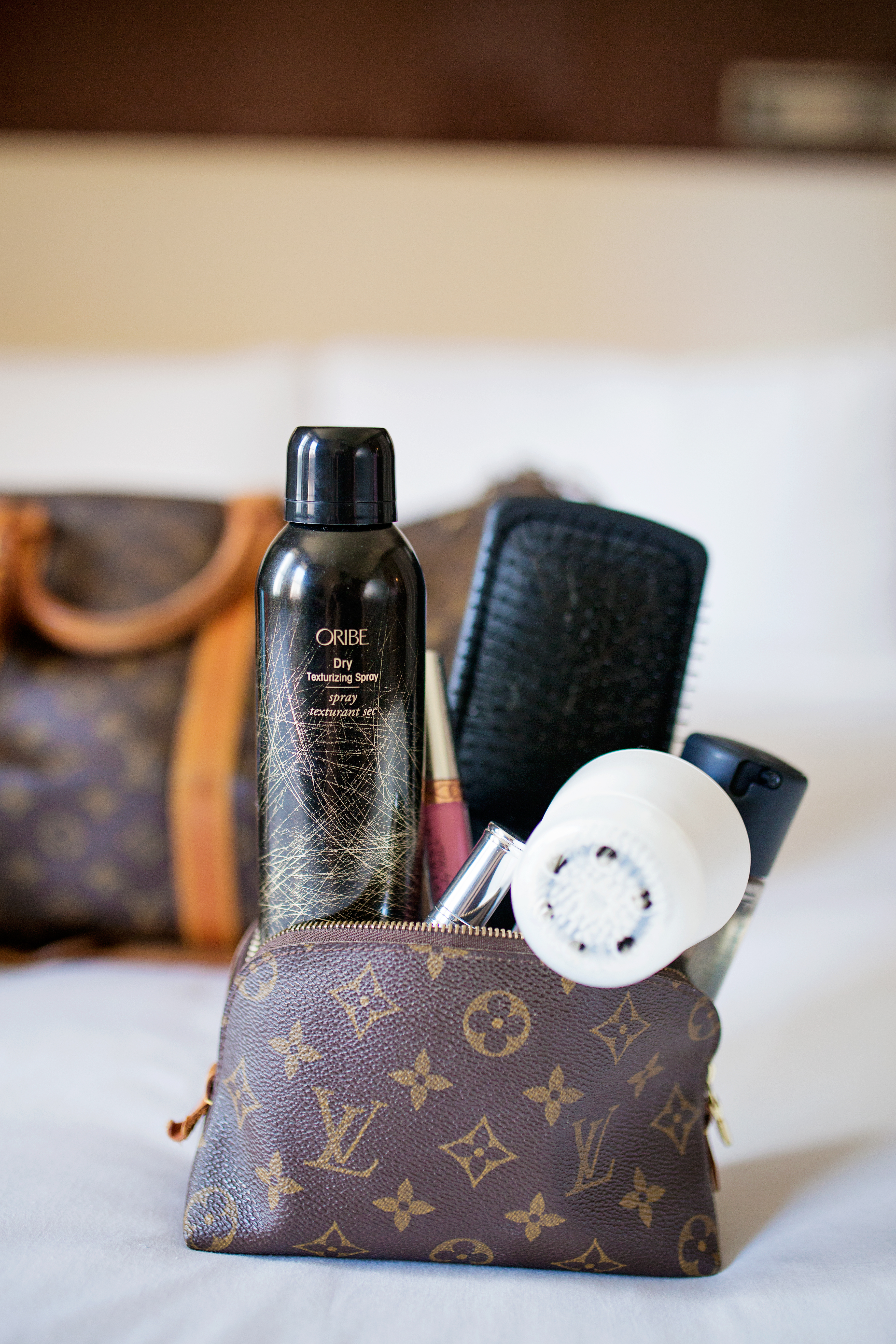 Louis Vuitton Makeup Pouch with Oribe and Clarisonic 