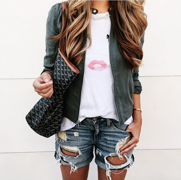 green jacket and kiss kiss top