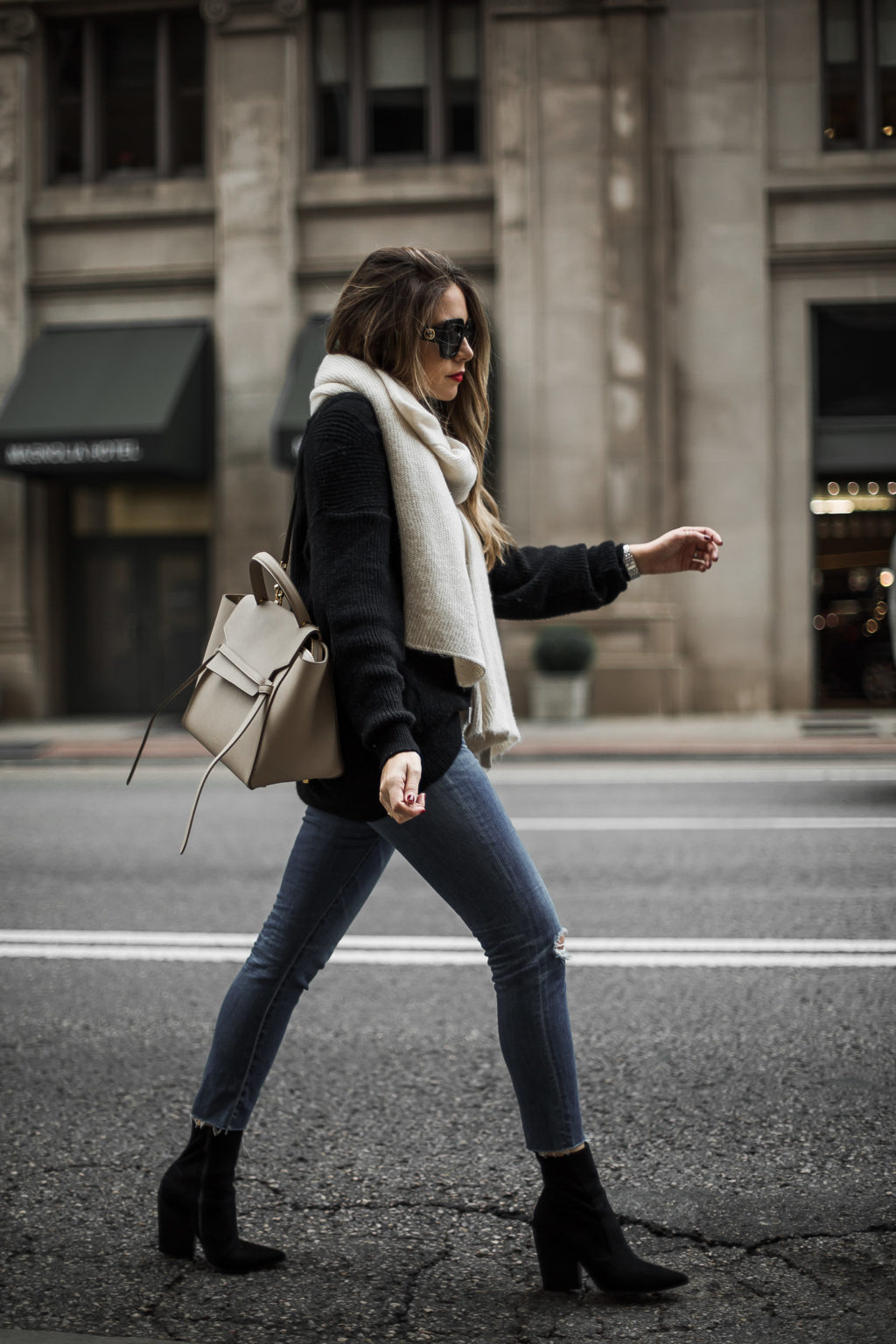 oversized sweater and distressed denim